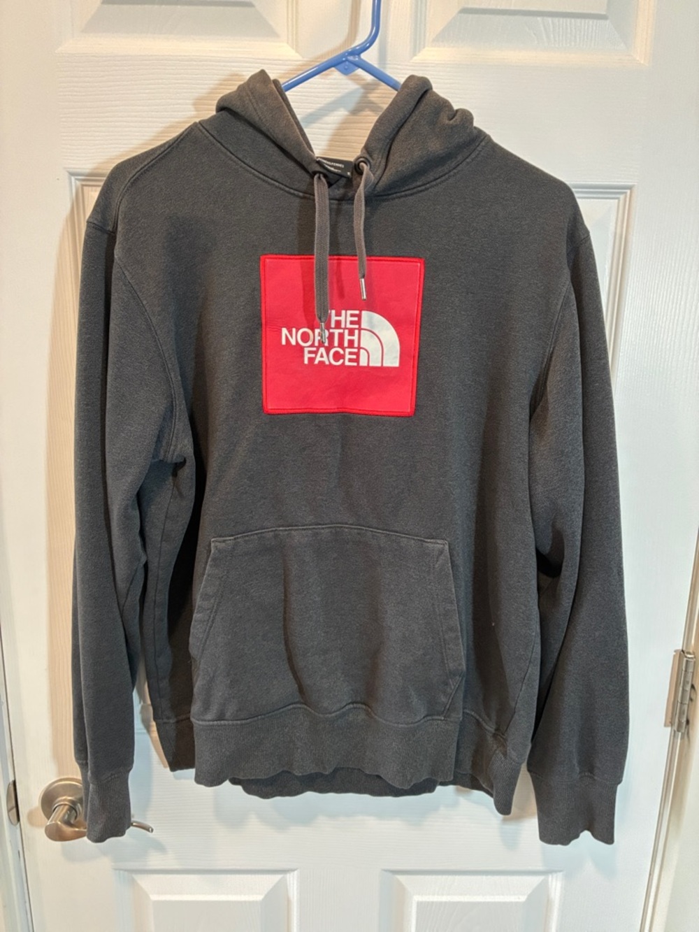 The North Face Charcoal Hoodie with Red Logo Patch